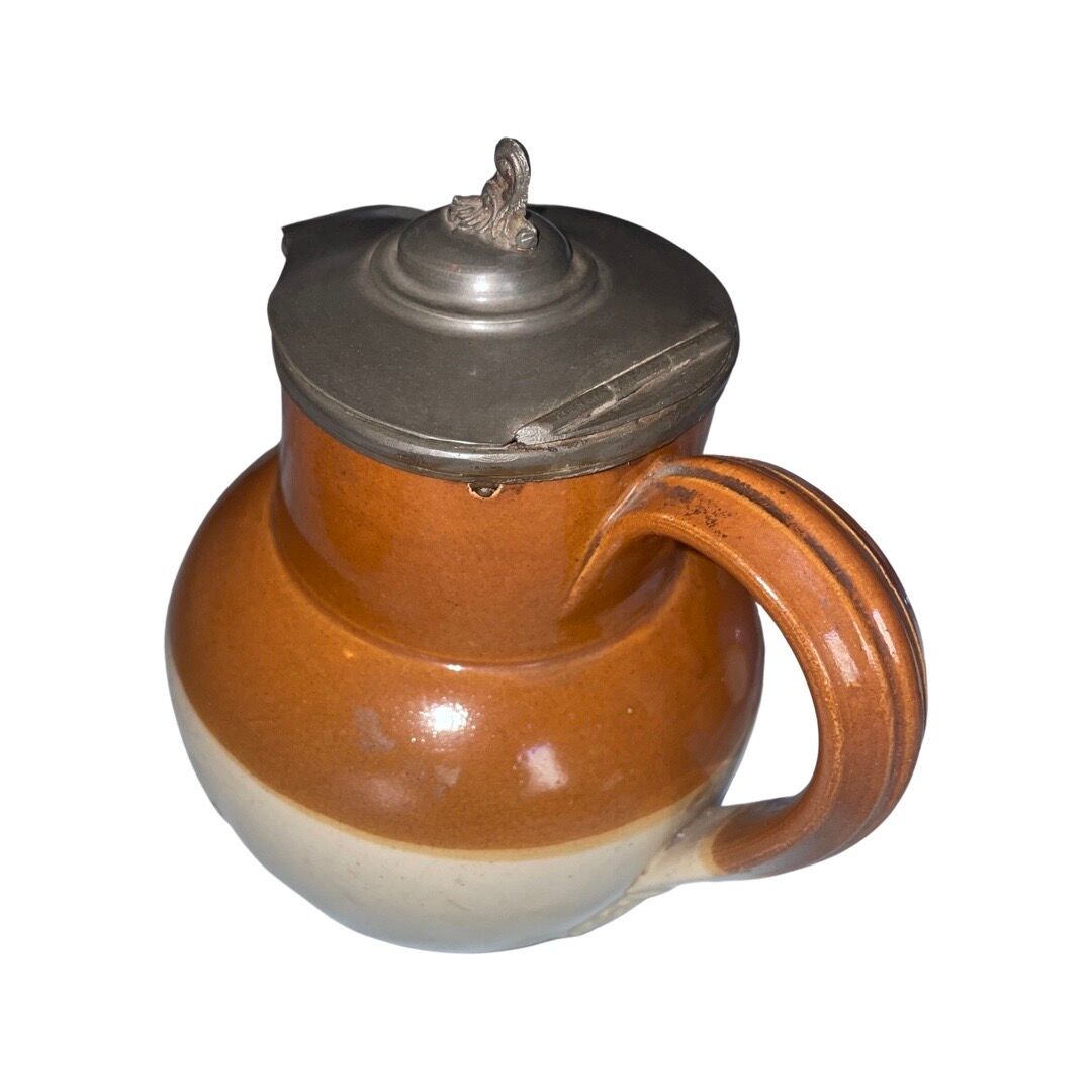 Old brown and beige Langley Mill 19th century pitcher with its pewter lid