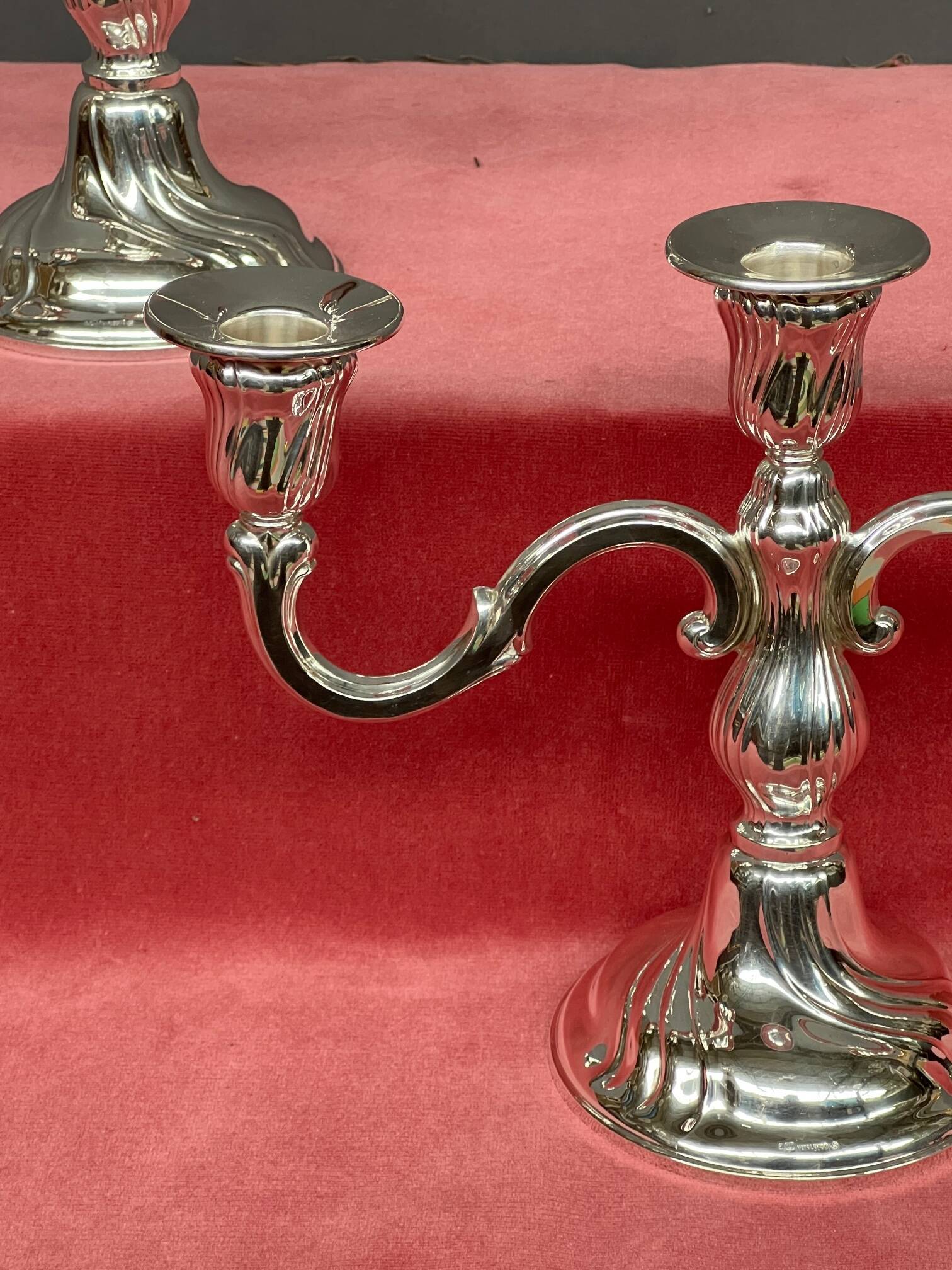 Pair of candlesticks. Silver-plated metal.