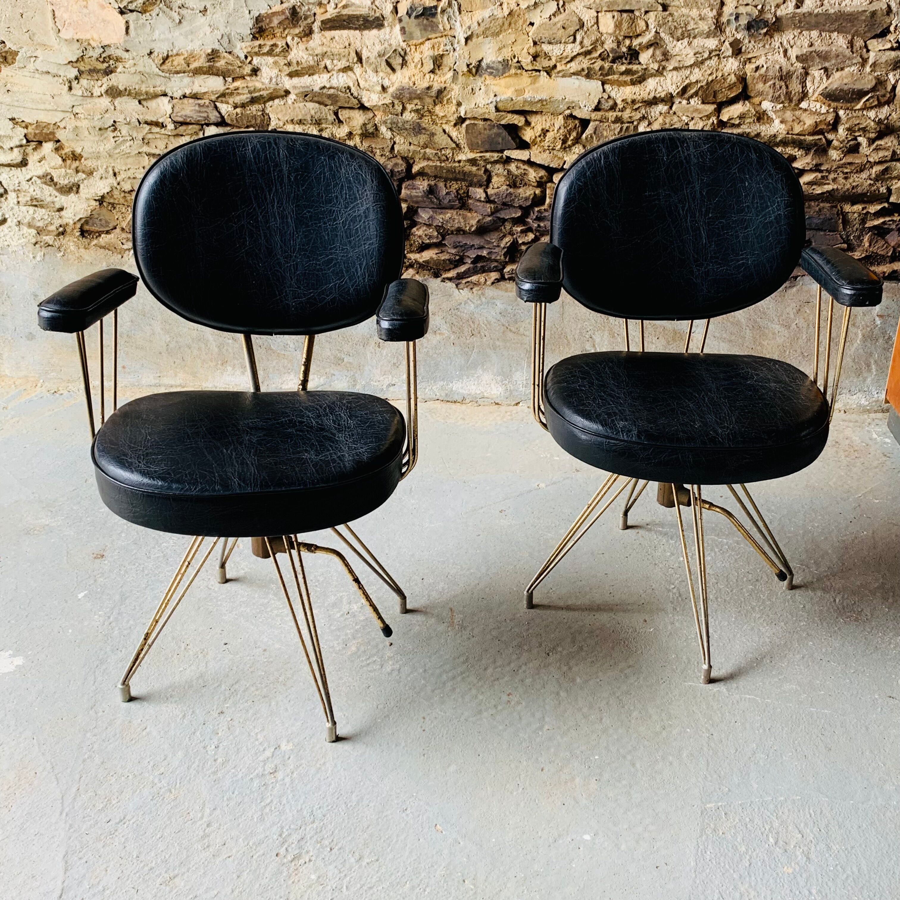 Set of 2 old hairdresser's chairs