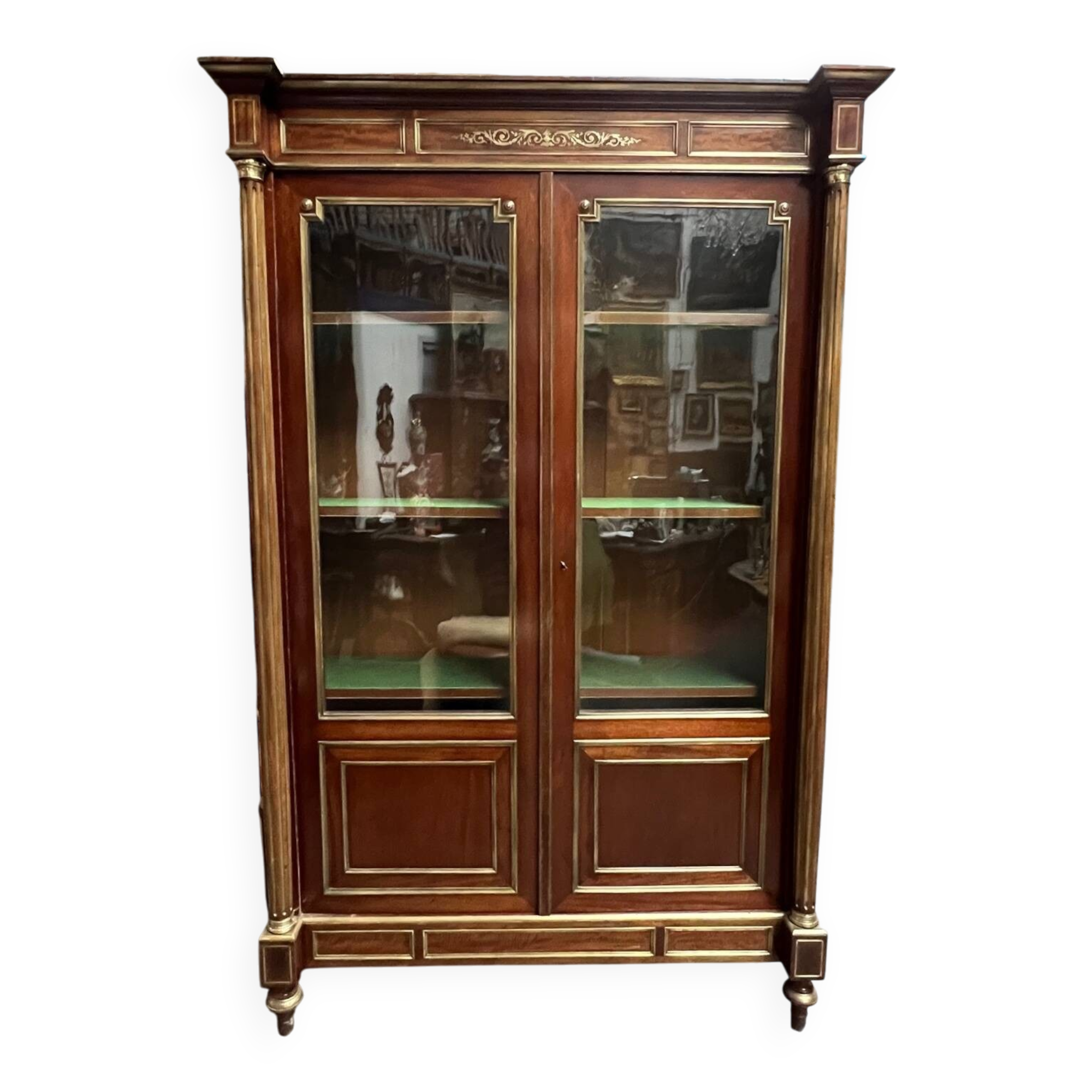 Library from the Napoléon III era. Brass inlay, mahogany, brass decoration.