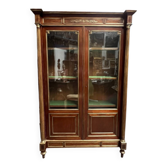 Library from the Napoléon III era. Brass inlay, mahogany, brass decoration.