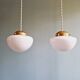 Duo of Art Deco suspensions in white opaline, 1920s-30s