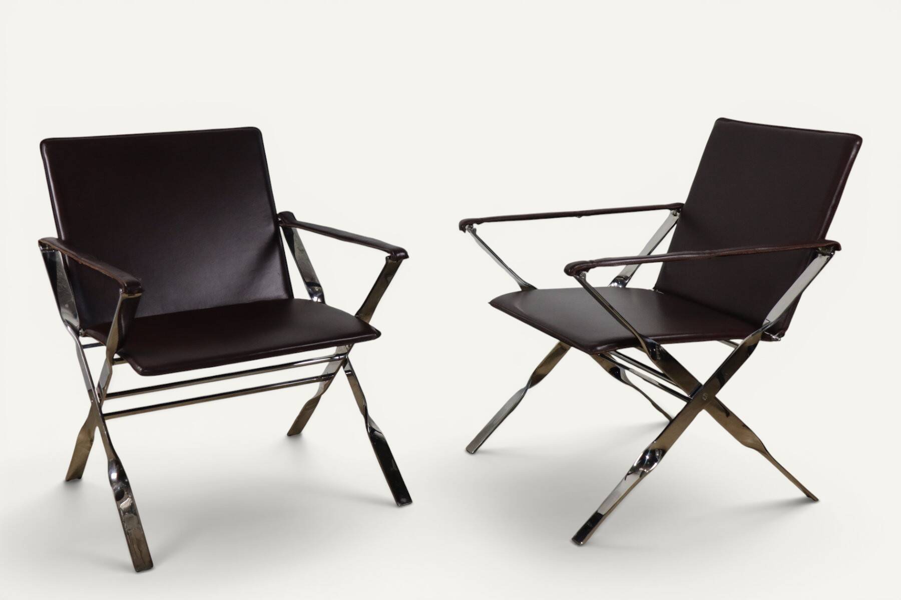 Pair of leather and chrome metal armchairs, Italy - 1970