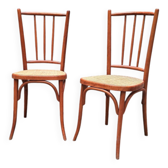 Paire de chaises bistrot en bois et cannage