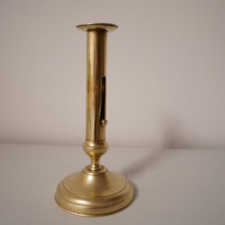 Brass candle holder with pusher