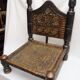Traditional low chair in wood and leather