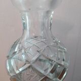 Decanter in crystal and tin accompanied by its cap