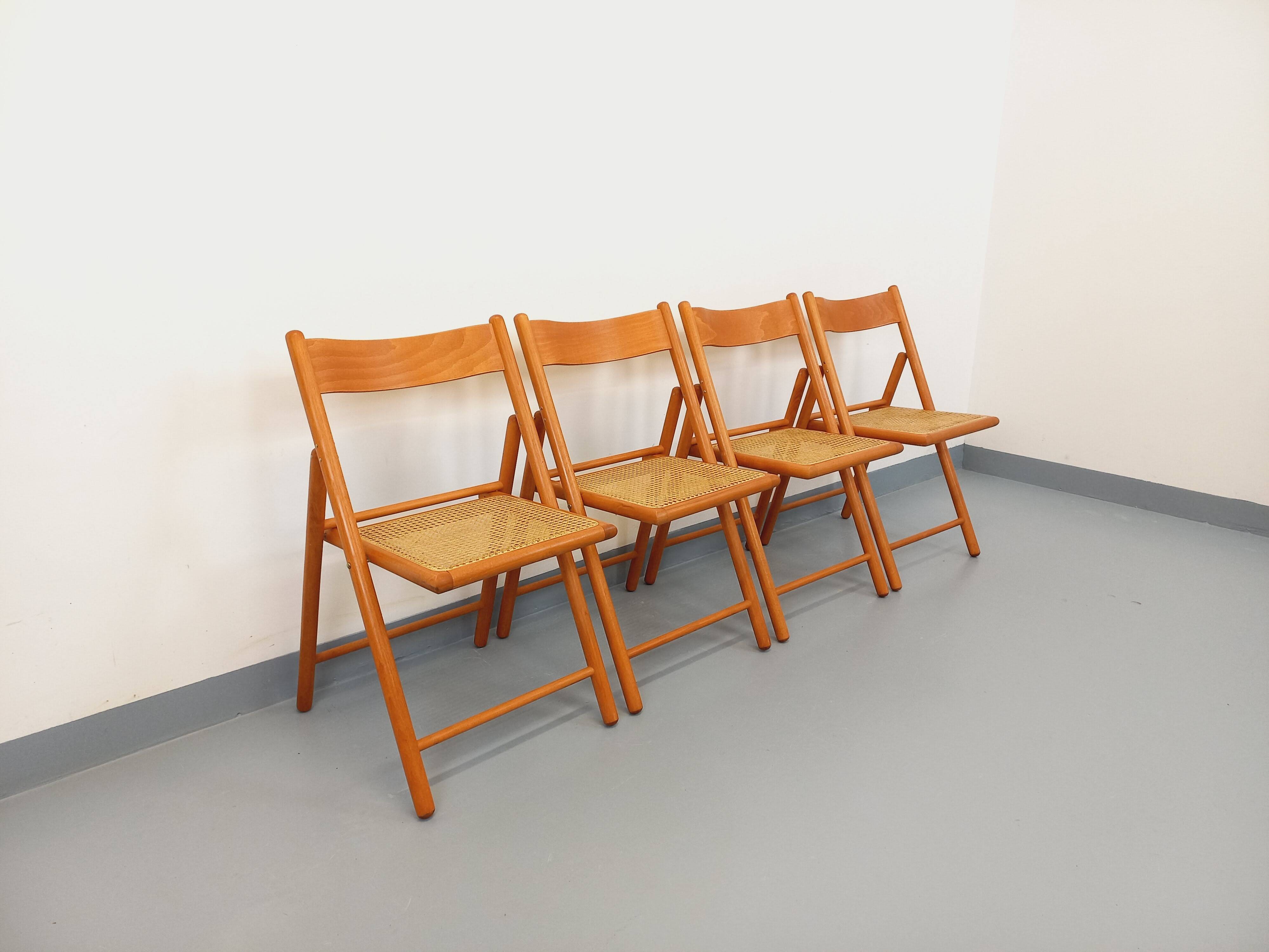 Set of 4 vintage folding chairs from Habitat made of beech wood and caning.