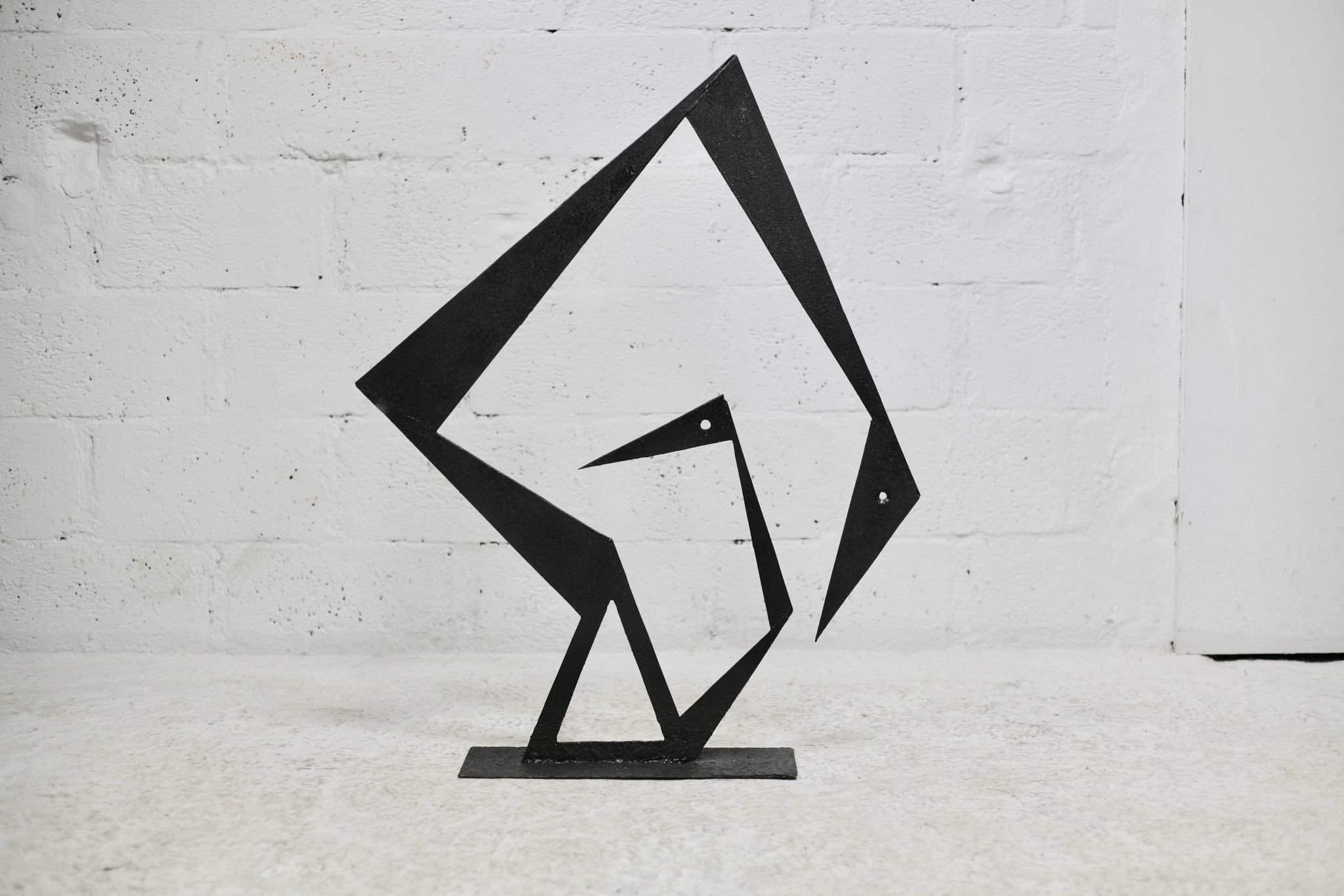 Steel sculpture, black, 1970s.