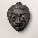 Ancient Indonesian bronze mask antique ethnic decoration tribal theater