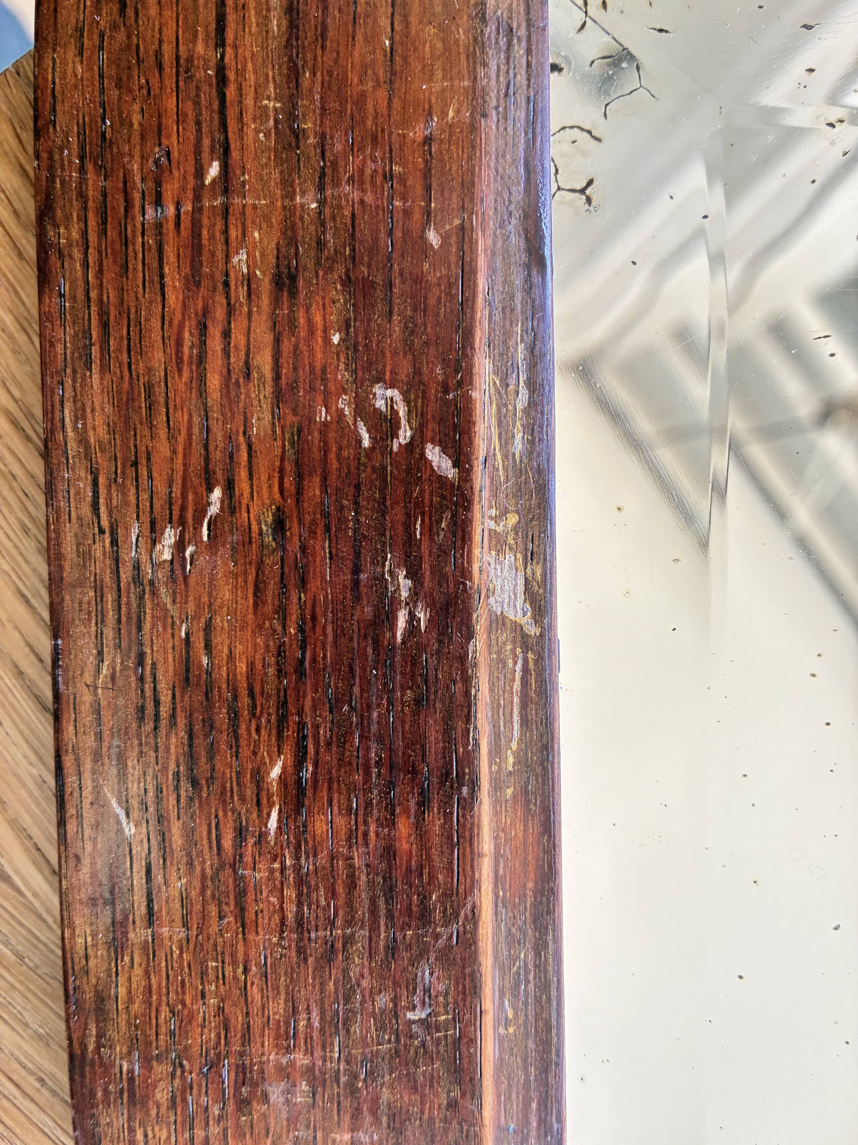 Bevelled mercury mirror with a wooden frame