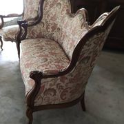 Three-piece walnut living room set consisting of two armchairs and one sofa