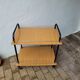 Rolling dessert trolley in formica – black tubular structure, 1960s.