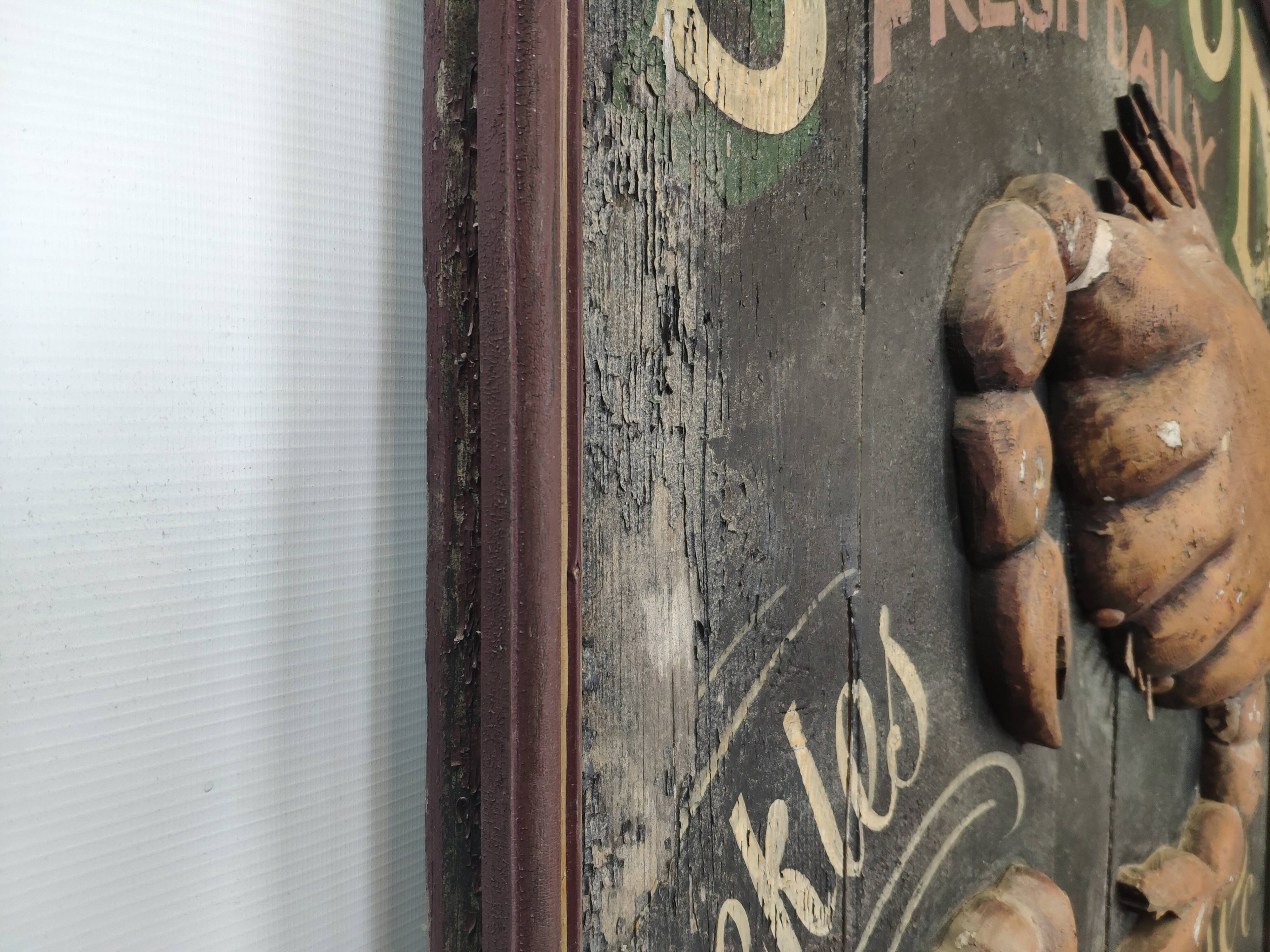 Former Seafood restaurant sign in rare relief