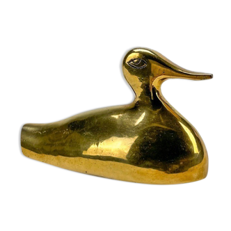 stylized duck in vintage brass
