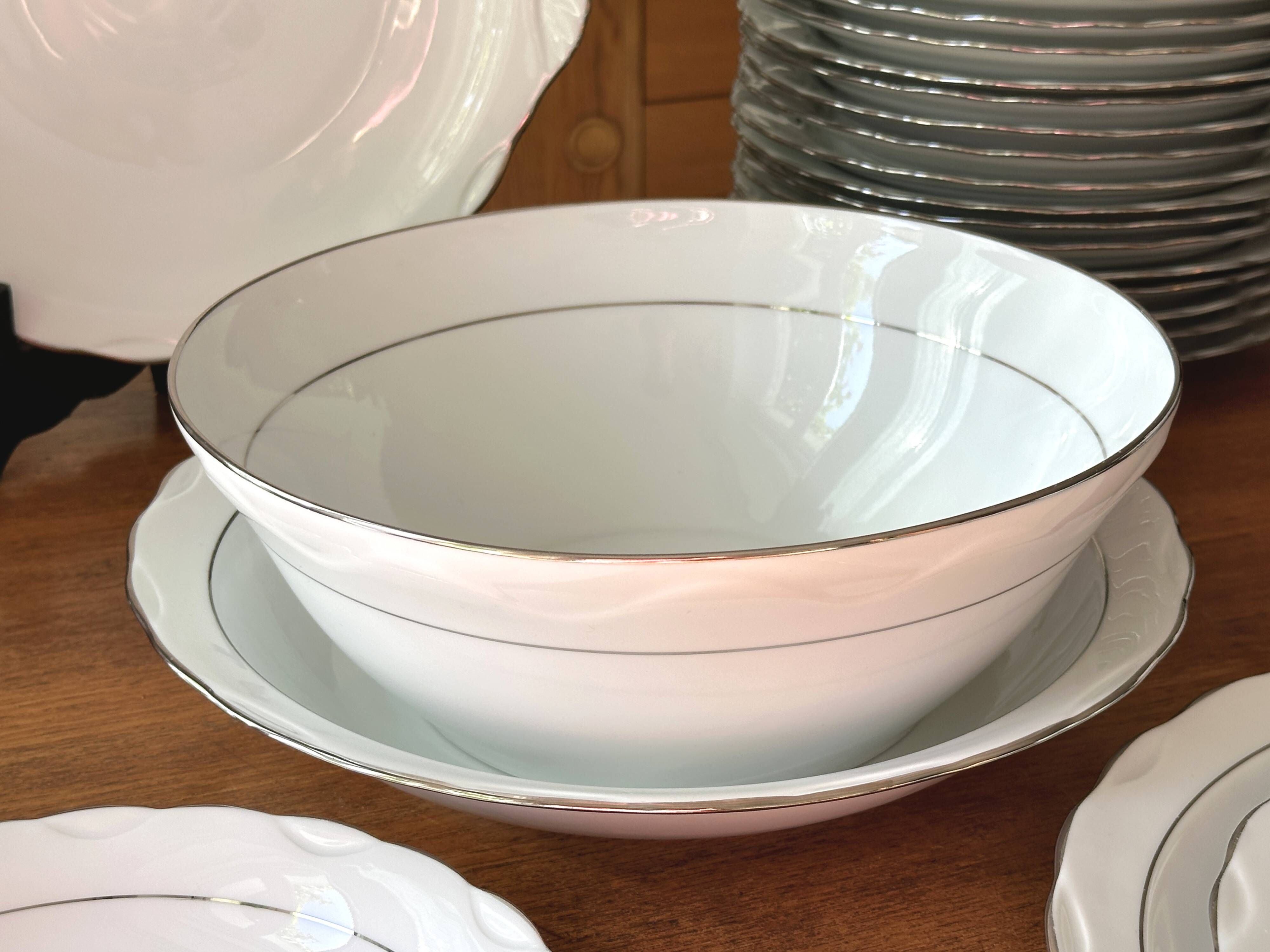 White and silver table service, Limoges porcelain, 56 pieces - in good condition.