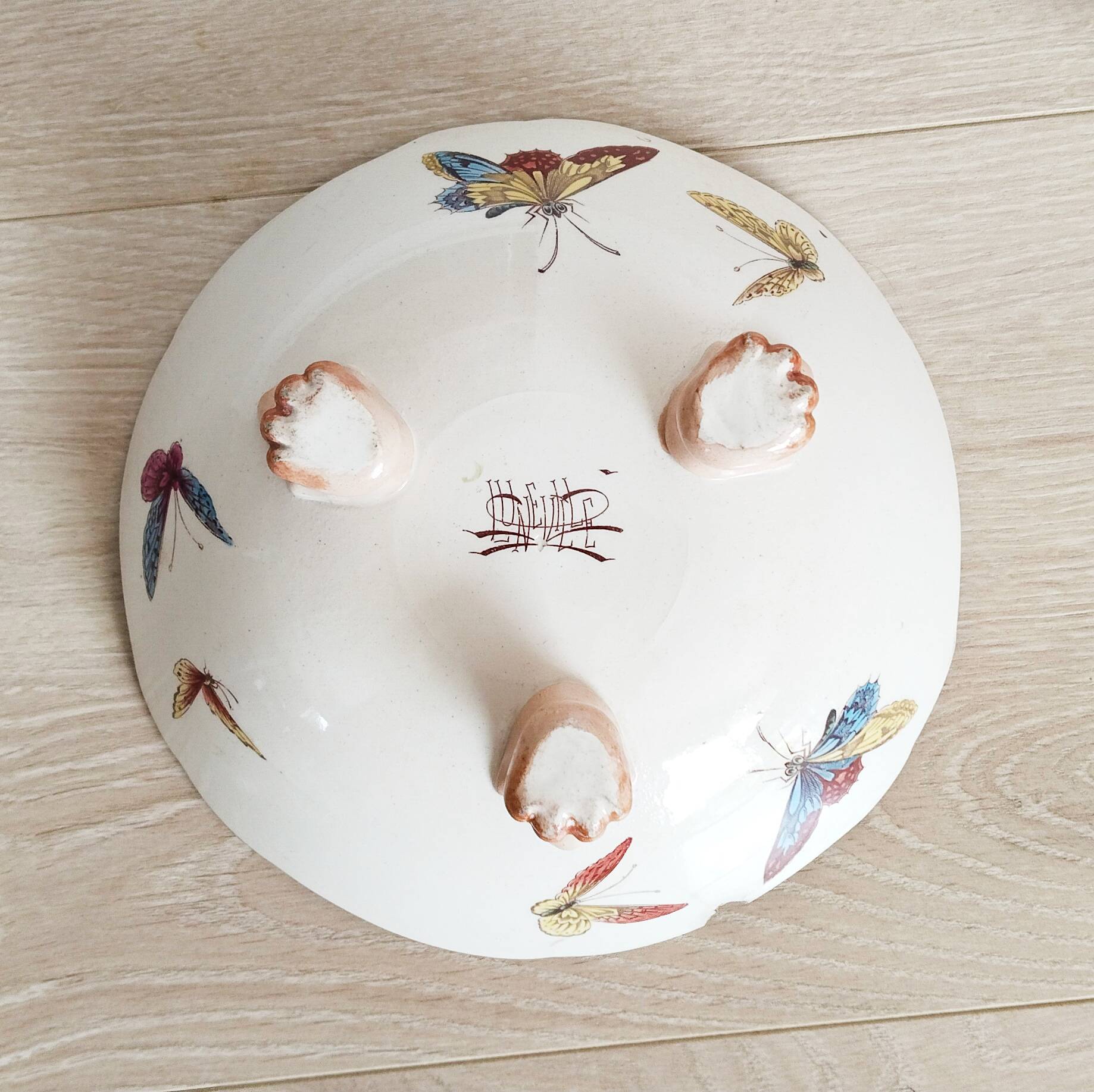 Fruit bowl with polychrome design in Lunéville earthenware, round dish