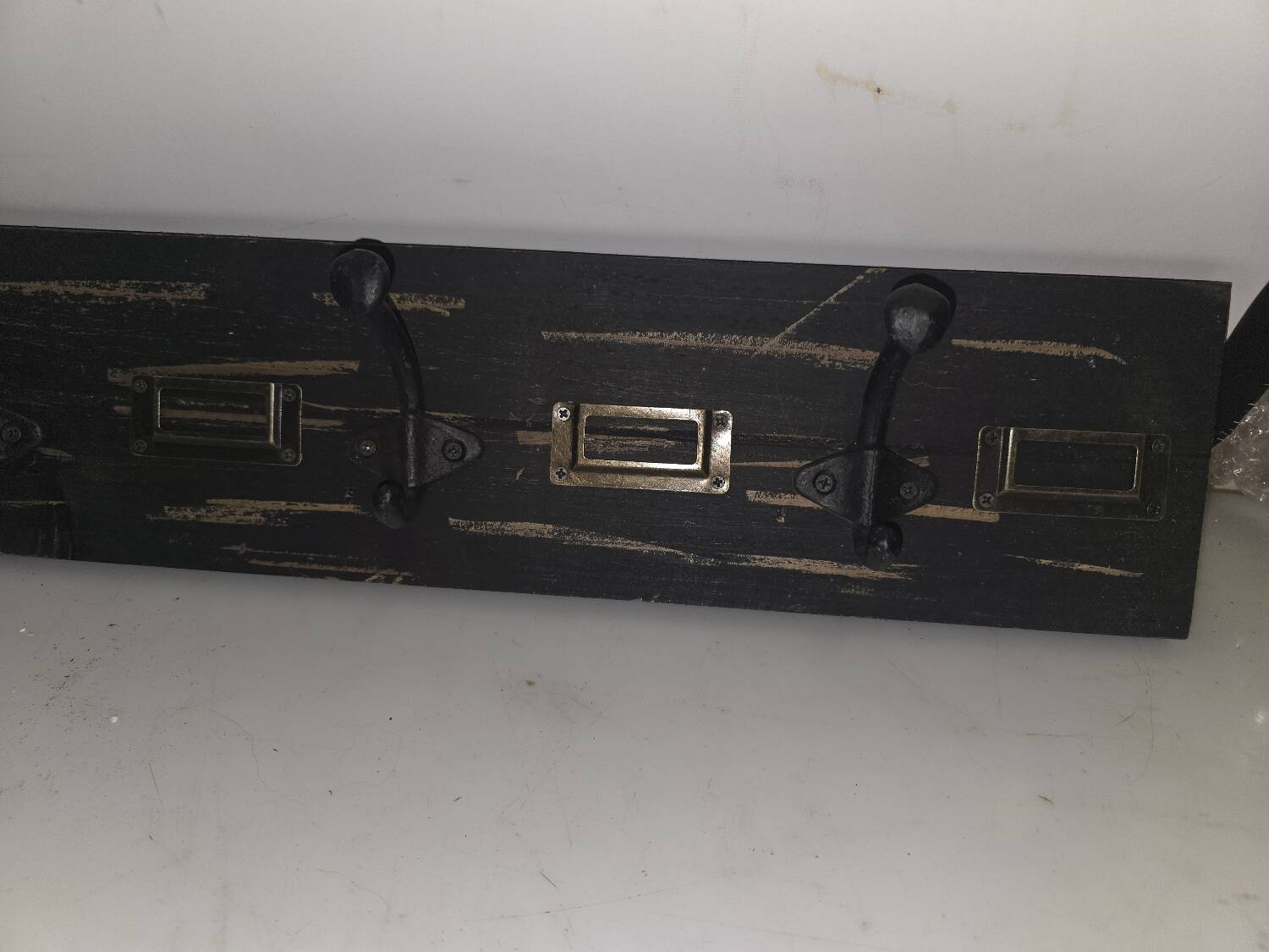 School coat rack with patinated black wooden labels 0