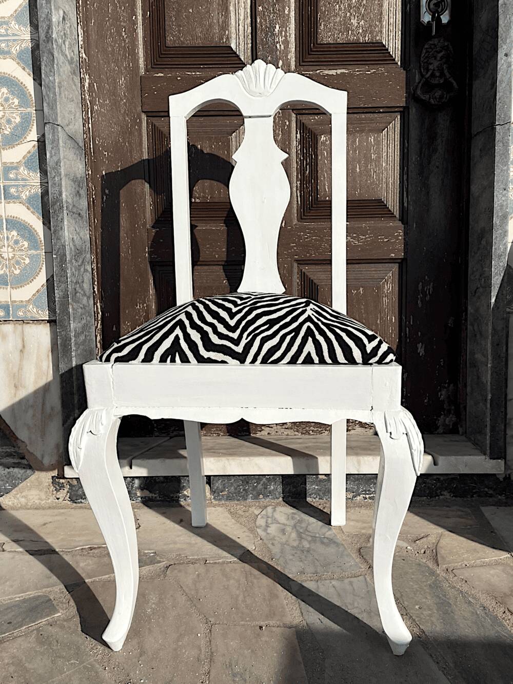 Antique Baroque chair redesigned in Zebra fabric