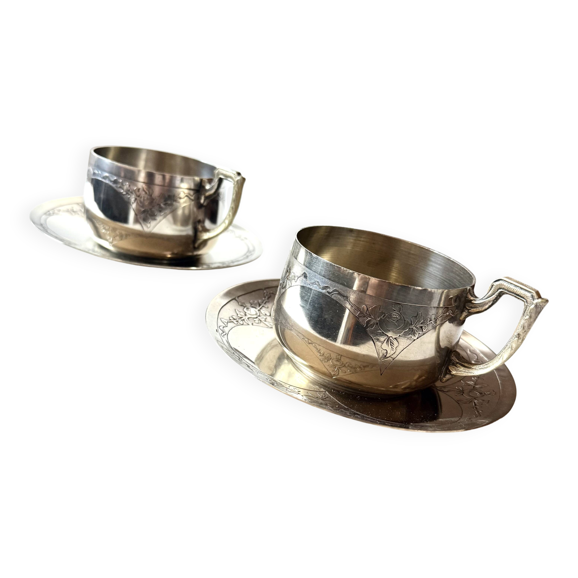 Set of 2 cups with silver-plated saucers, 19th century.
