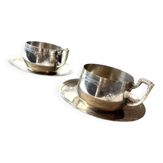 Set of 2 cups with silver-plated saucers, 19th century.