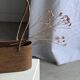 Small oval basket with long handles, traditional Indonesian L28xH10