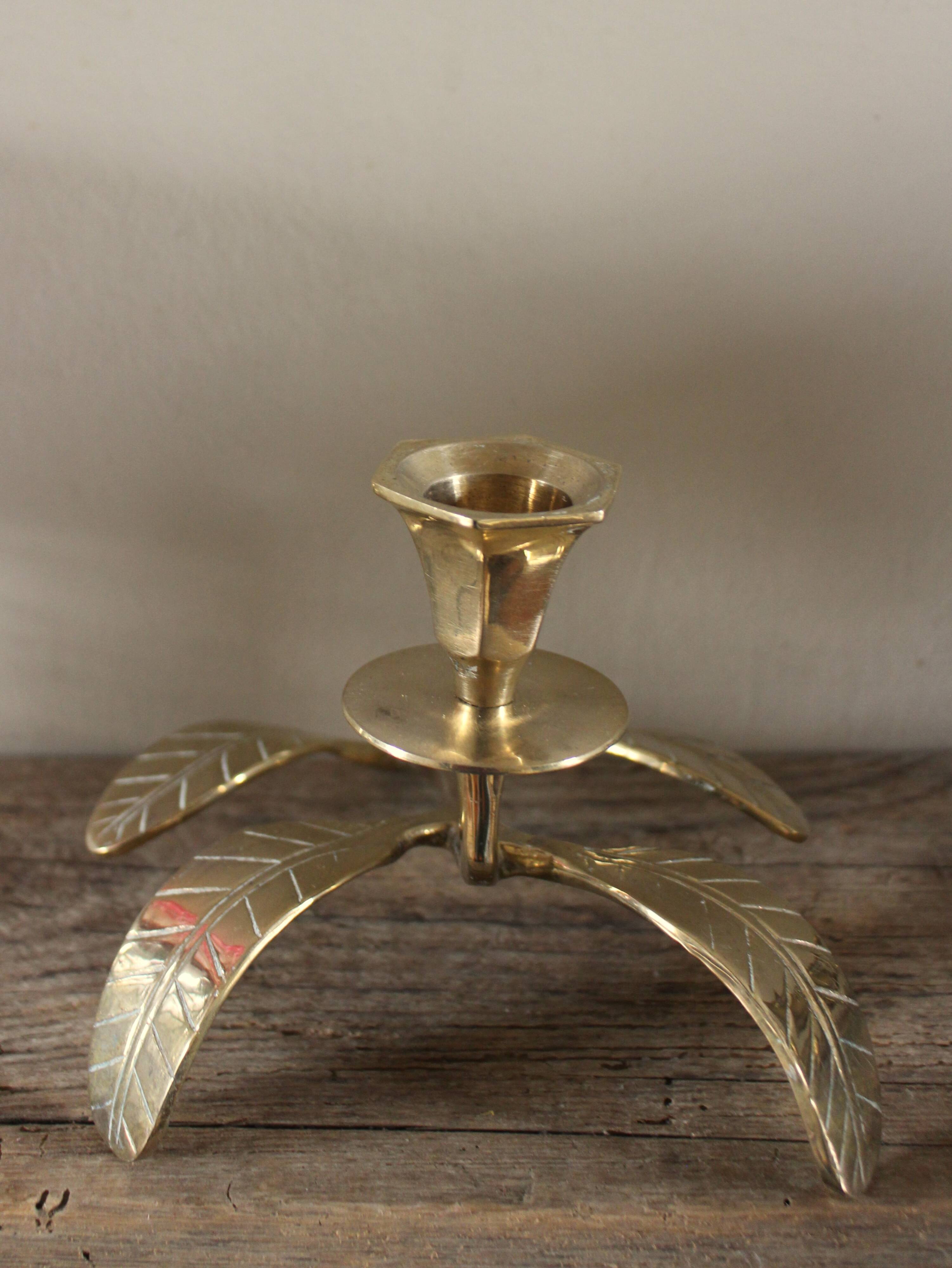 Brass candle holder with oval leaf branch