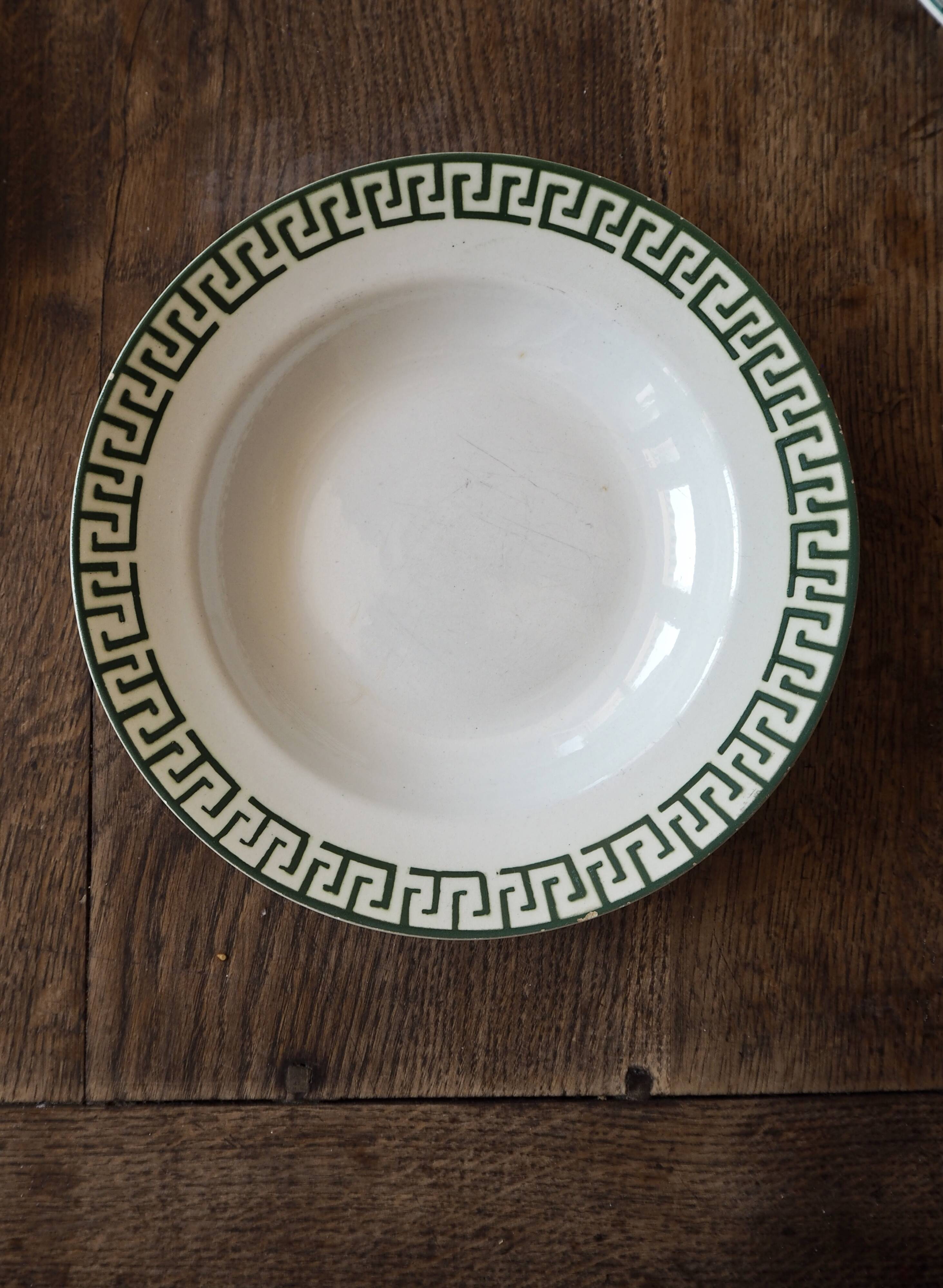 Set of 12 green patterned soup plates, Badonviller earthenware