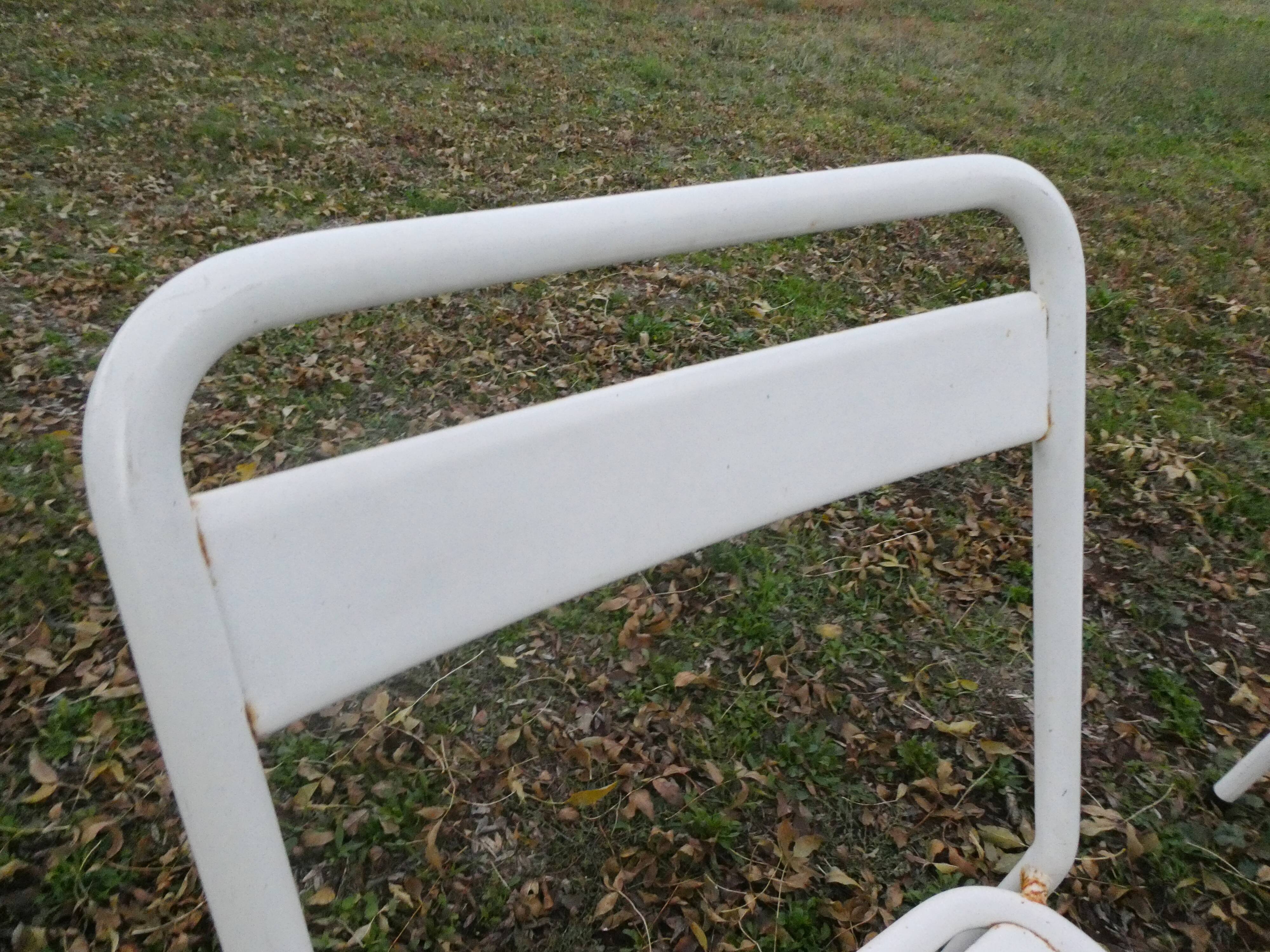 Duo of bistro style indus terrace chairs