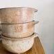 Three bowls in ancient sandstone