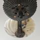 Art Deco bronze three-arm chandelier with marbled glass shades.