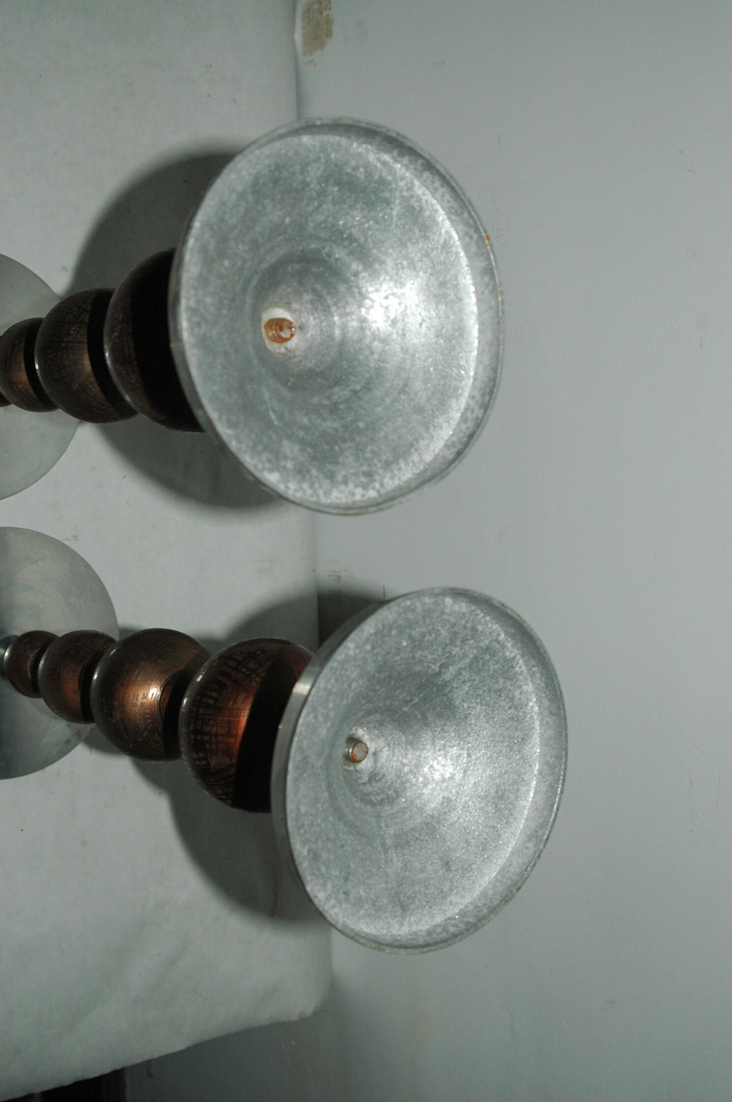 Pair of brutalist aluminum and copper candle holder
