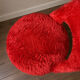 Pair of vintage red shaggy armchairs from the 1960s.