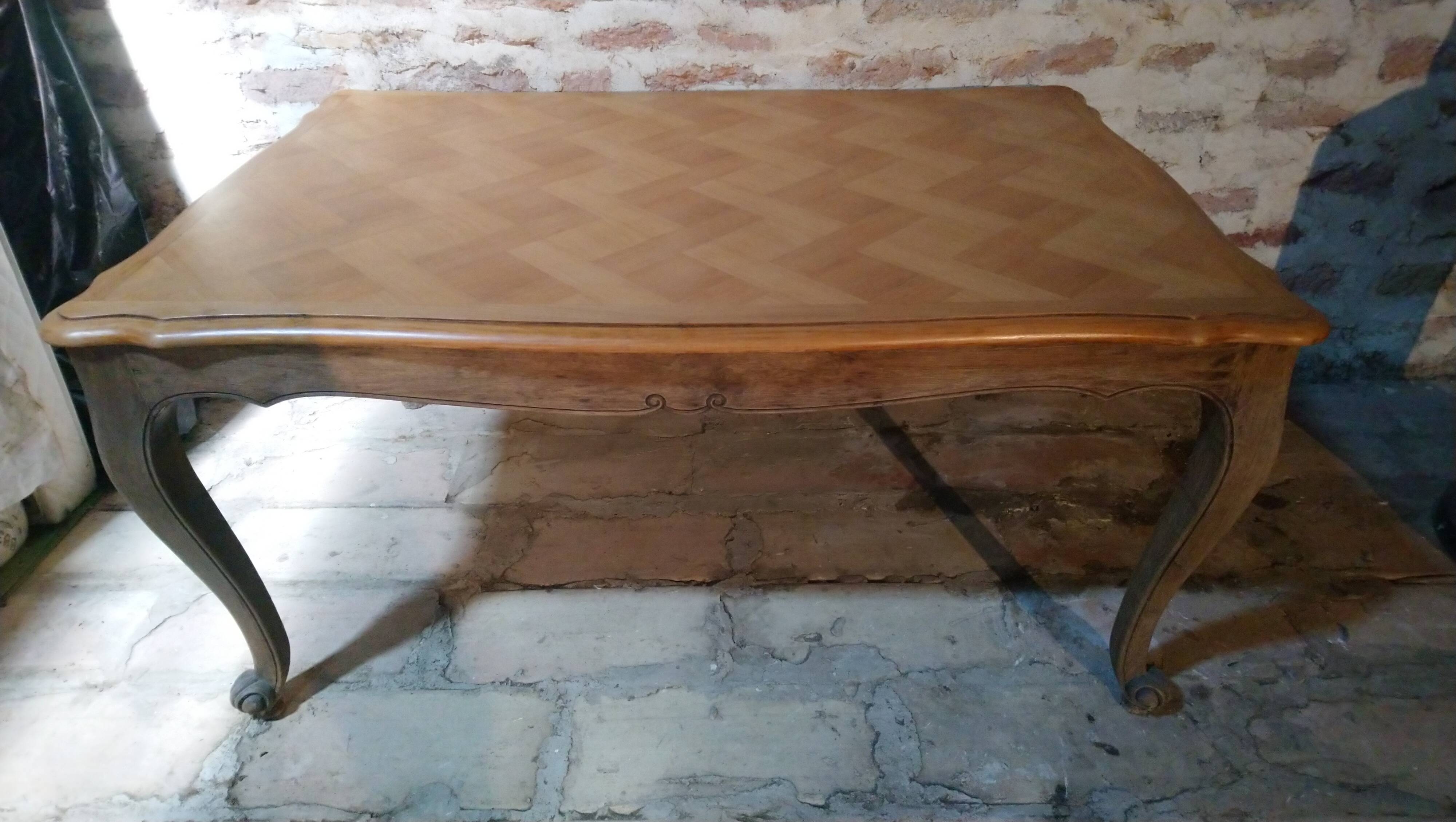 Louis XV style table in oak and cherry wood.