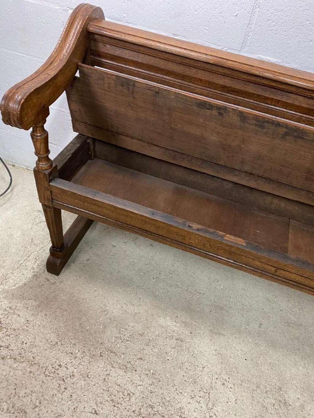 Antique wooden bench with pinned construction