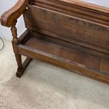 Antique wooden bench with pinned construction