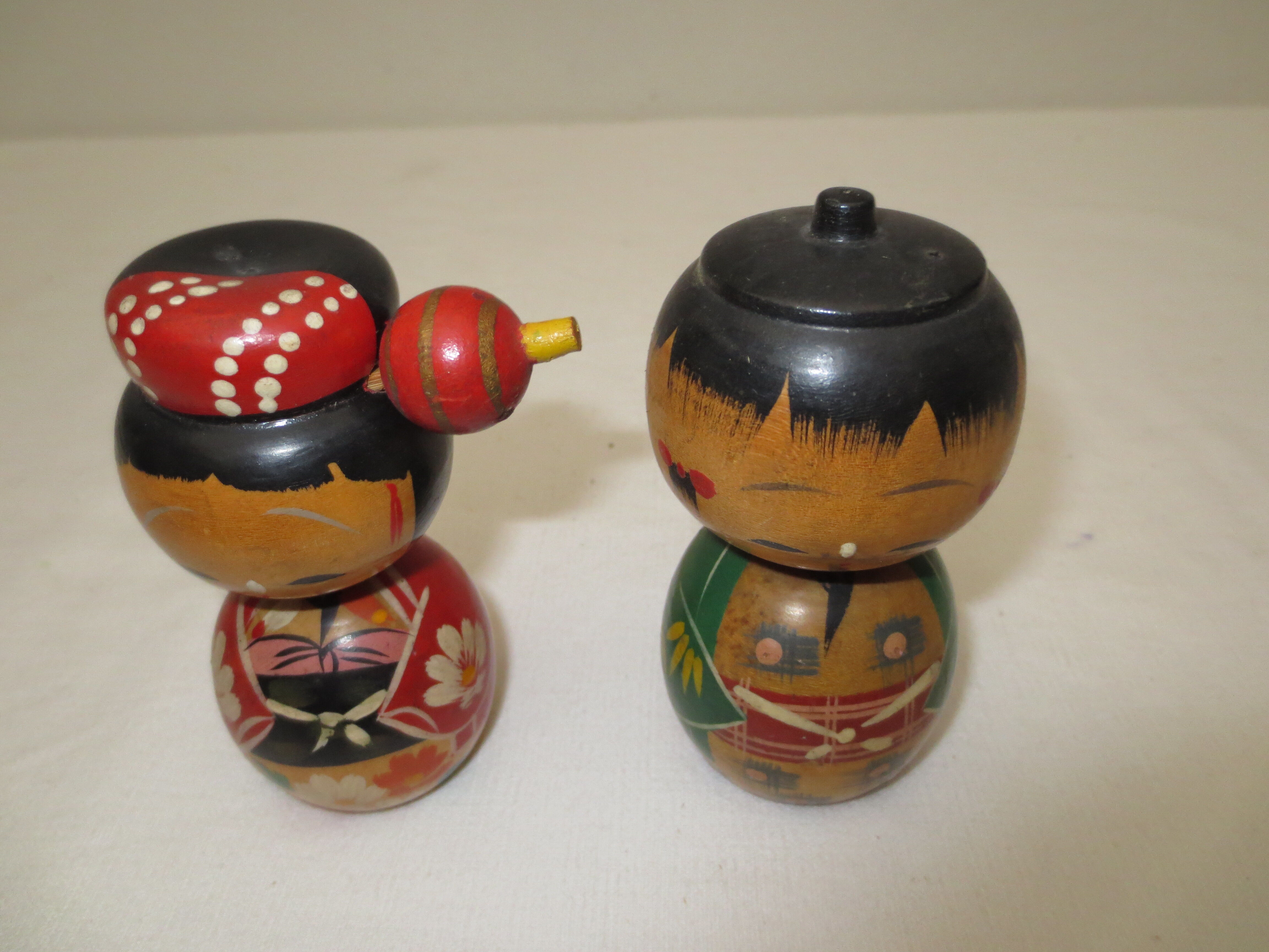 Couple of japanese dolls painted wooden