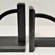 Pair of bookends in black lacquered steel design 60s