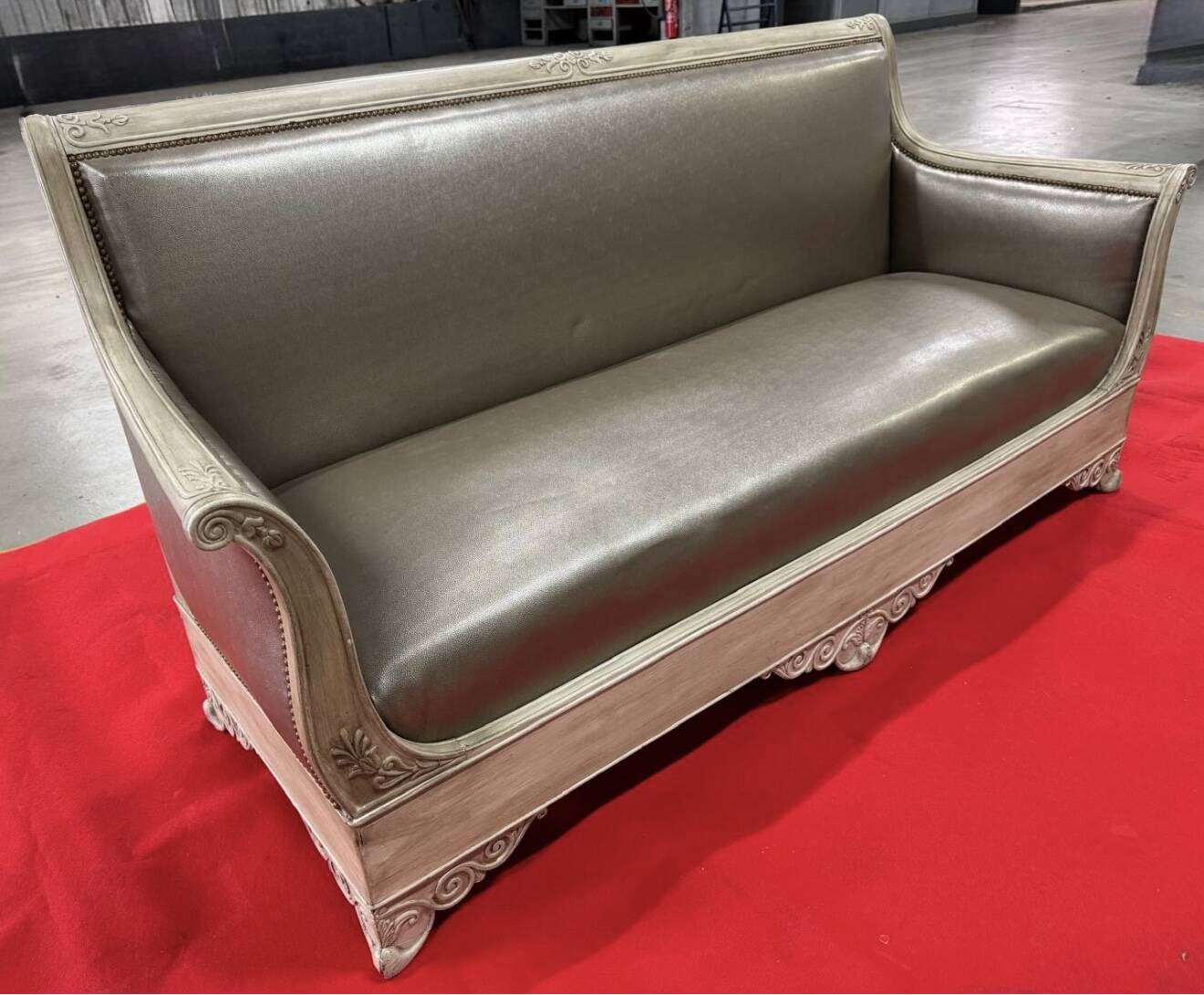 Antique banquette covered in faux shagreen.