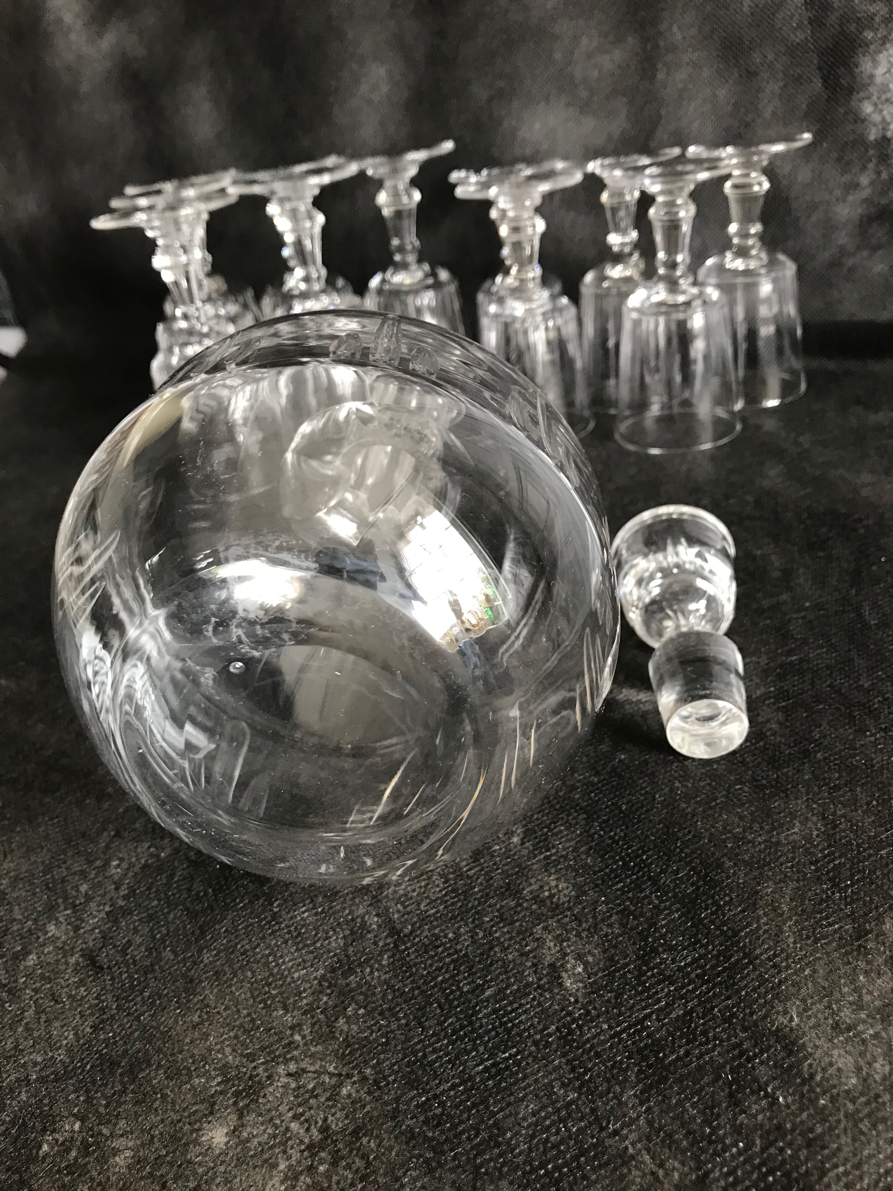 11 glasses and 1 wine carafe