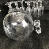 11 glasses and 1 wine carafe