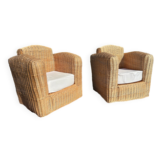 Large rattan armchairs