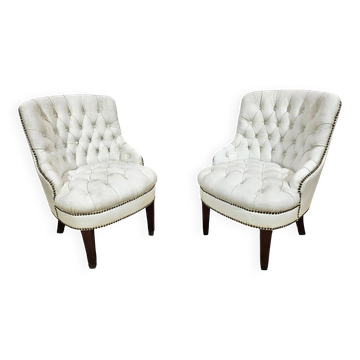 A pair of chesterfield armchairs, England, 1960s