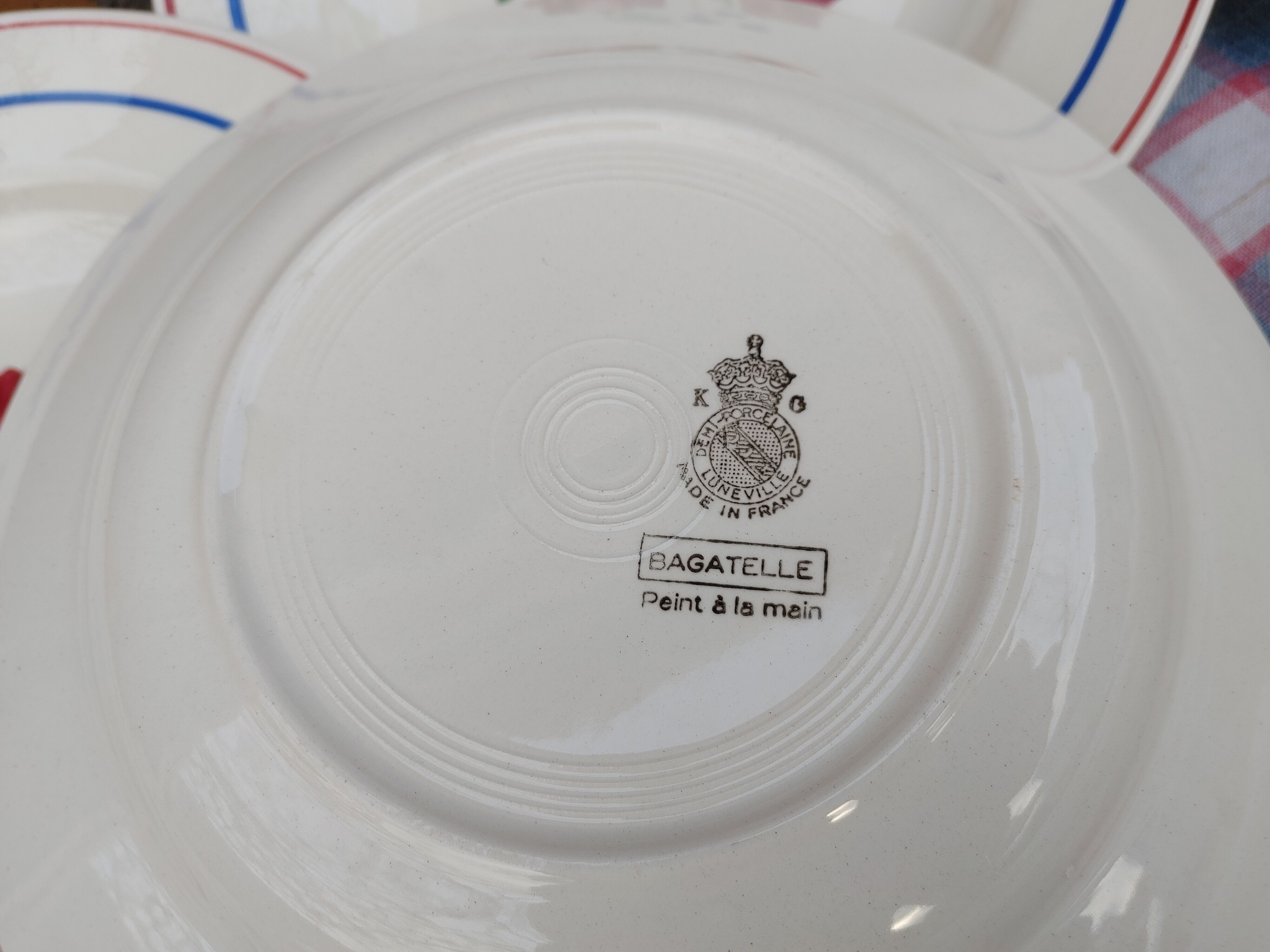 11 Deep Plates “Lunéville” Bagatelle model, Floral decoration Ø 23 cm