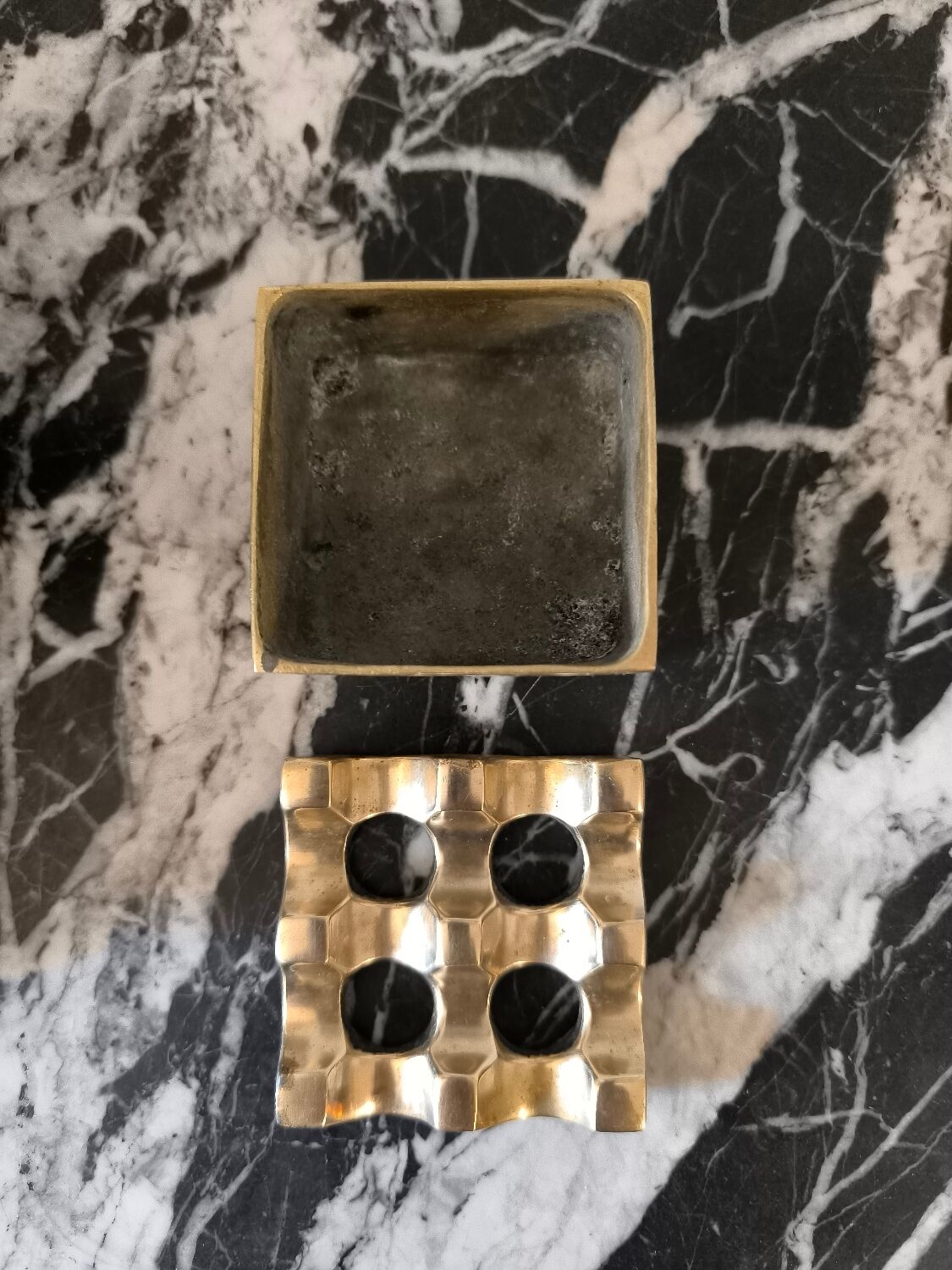 Ultima ashtray in gold-plated brass designed by Holger Bäckström & Bo Ljungberg.