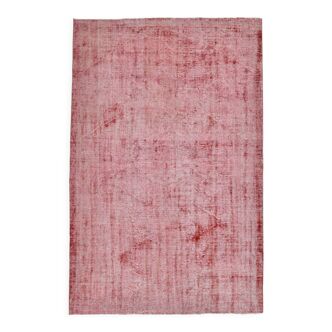 Pale red modern vintage rug