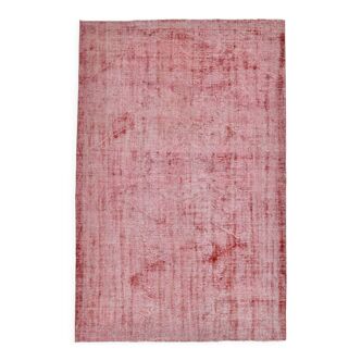 Tapis vintage rouge pâle