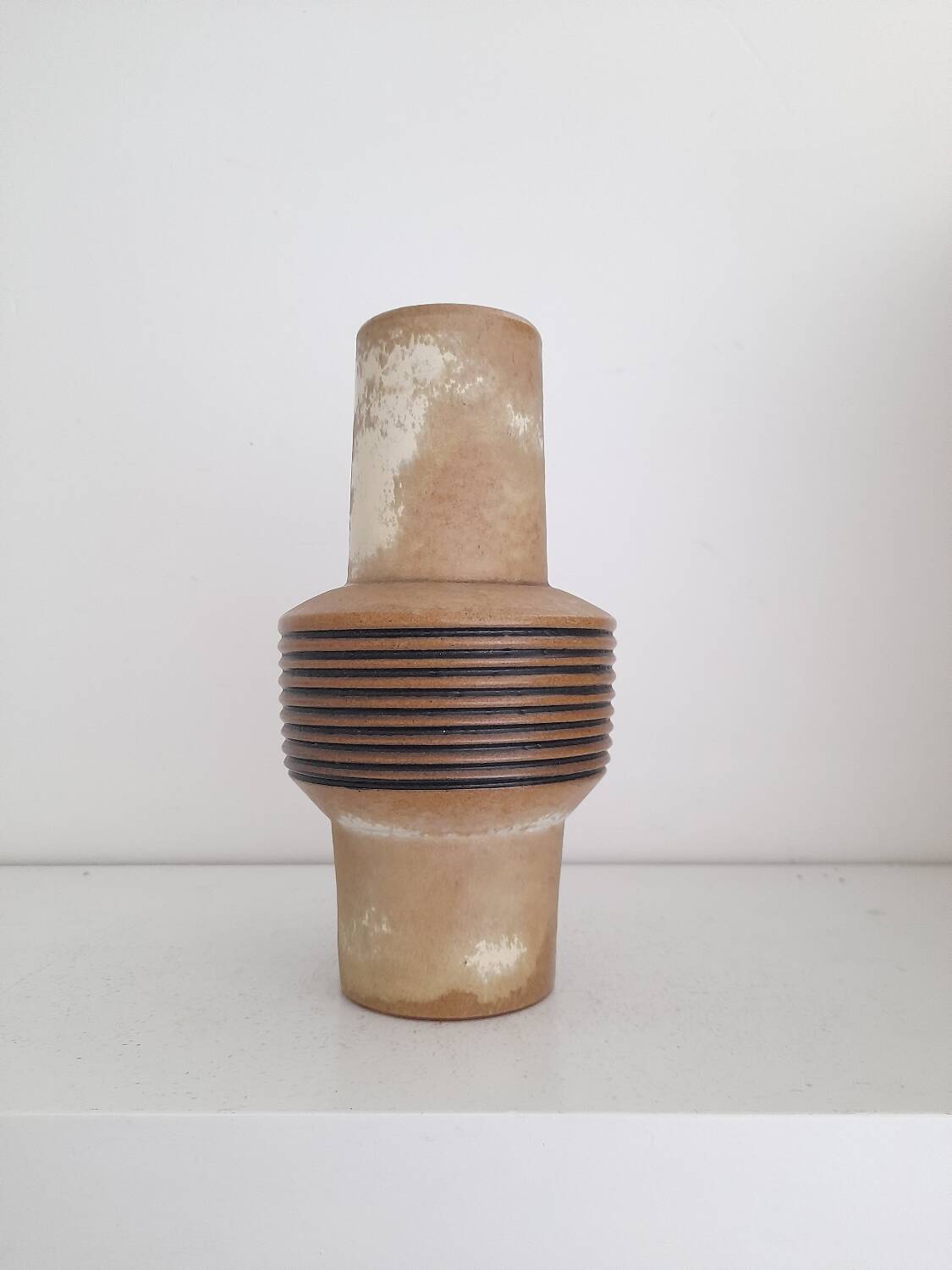 Beautiful ceramic saucer vase