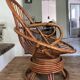 Pair of rotating rattan armchairs