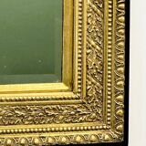 Vintage rectangular classical gold and black mirror. France, 1970s.